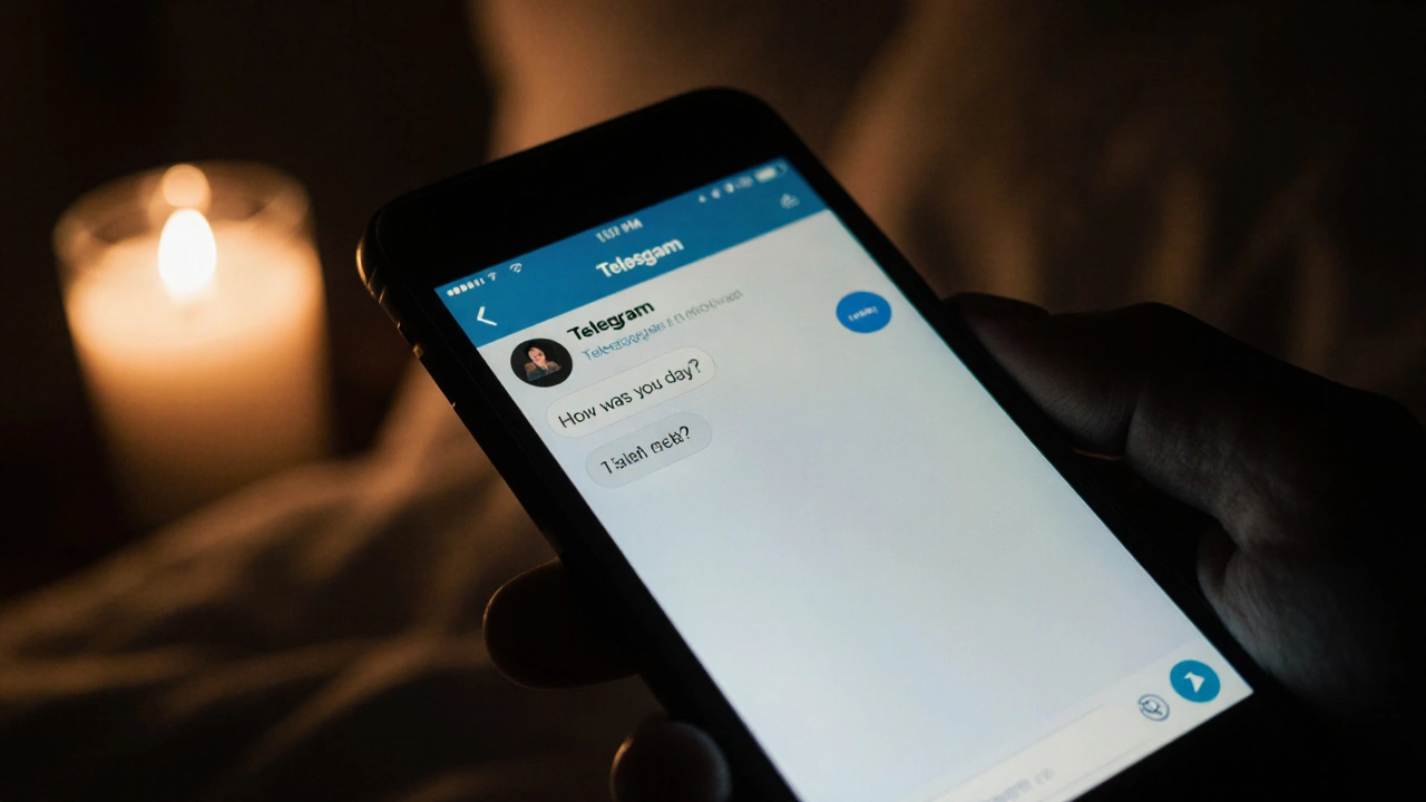 A phone screen showing a kind Telegram message in the dark.