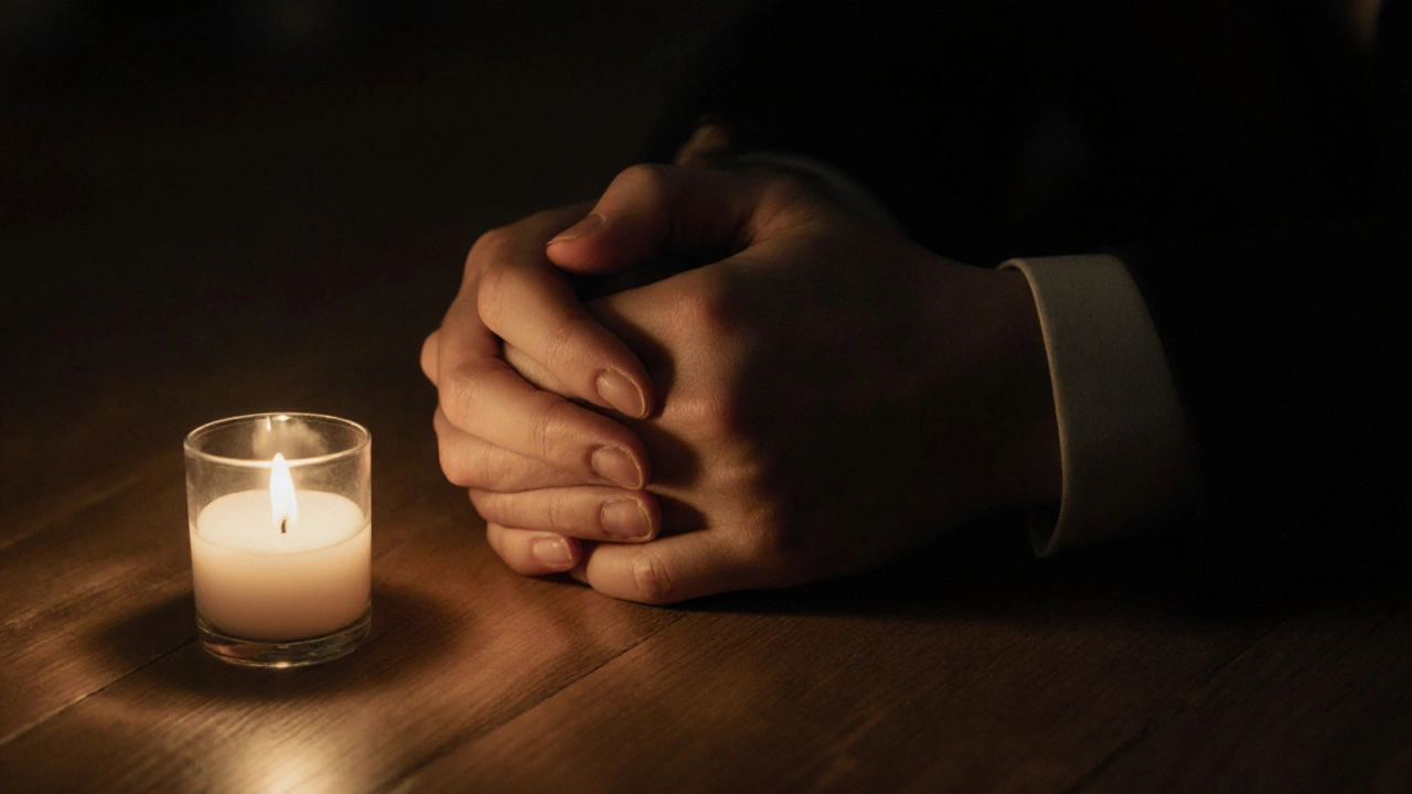 Two hands clasped together in quiet intimacy, no faces visible, candlelight nearby.