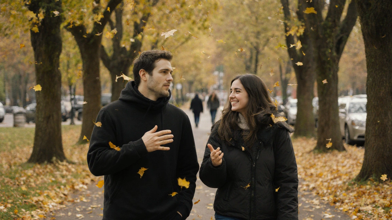 Two people walking together in an autumn park, sharing a quiet, thoughtful moment.