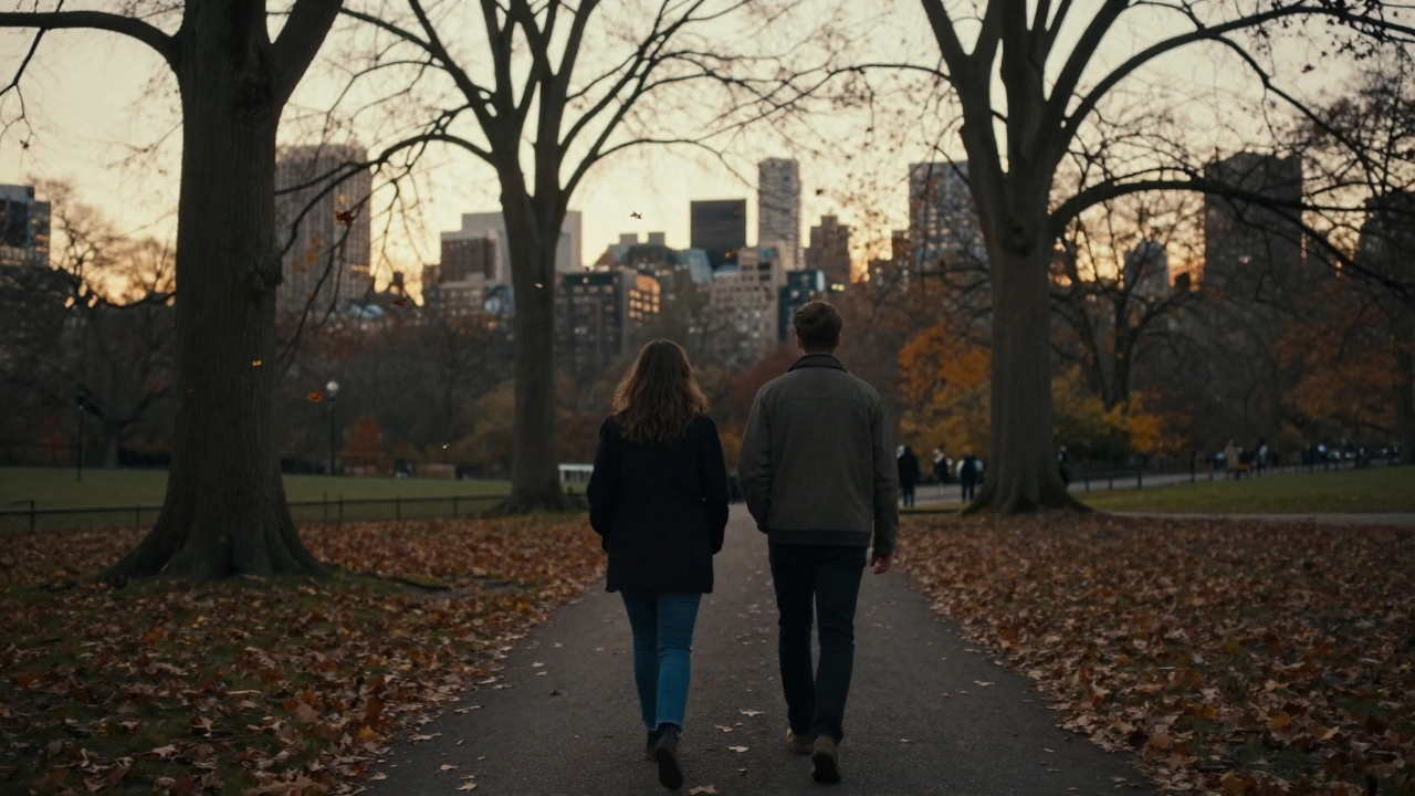 Two people walking peacefully in Hyde Park at dusk, backs turned, no faces shown.