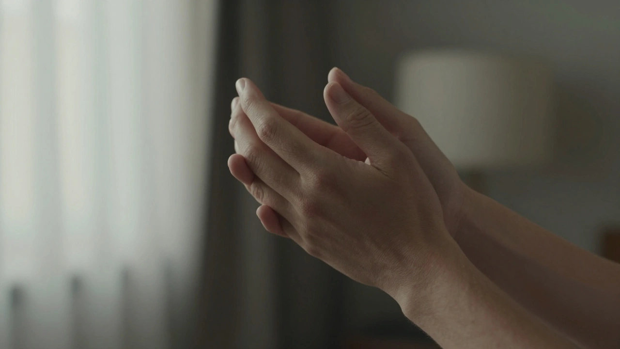 Two hands gently holding each other in natural light, conveying quiet intimacy.